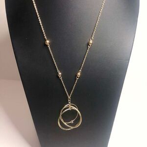 1030 Gold tone interlocking circles pendant necklaces Marked NRT 28-32"